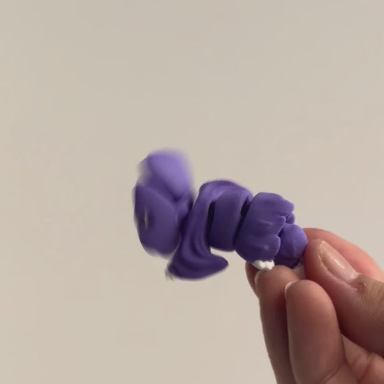 Bat CHONK shown moving in a hand.