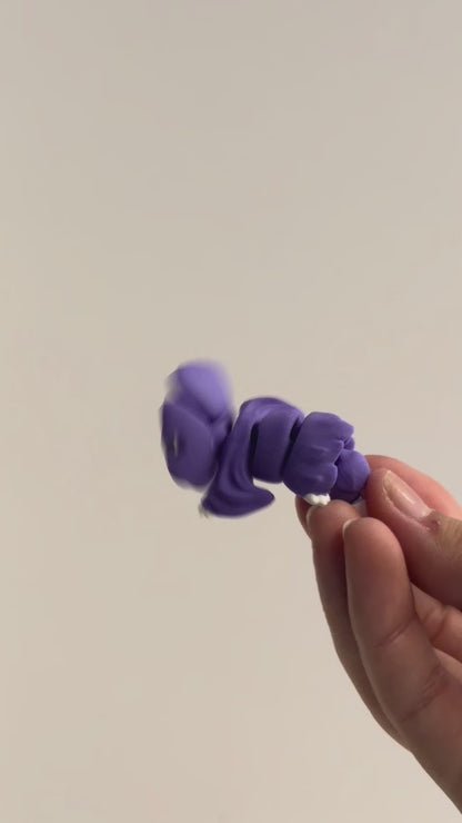 Bat CHONK shown moving in a hand.