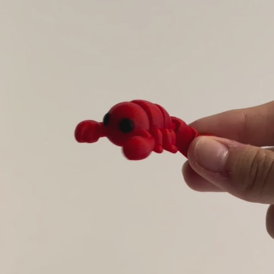 Steven (Scorpion) shown moving in a hand.