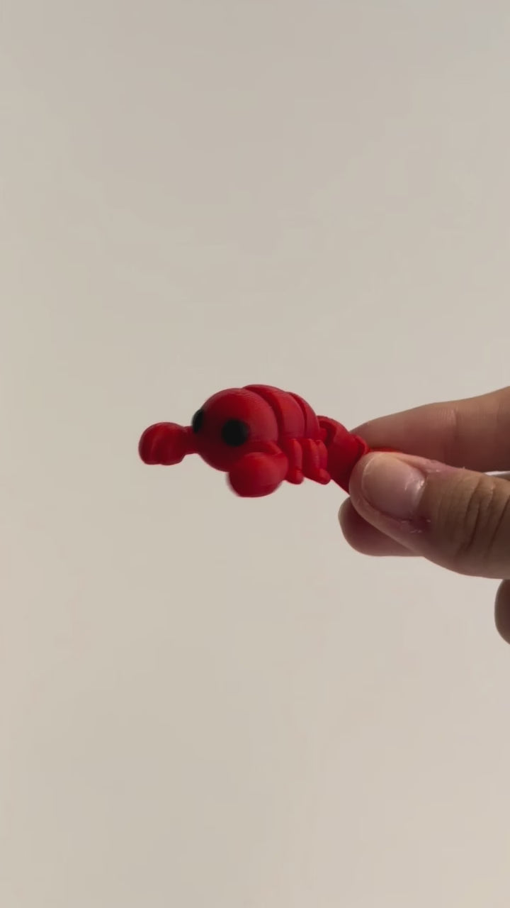 Steven (Scorpion) shown moving in a hand.