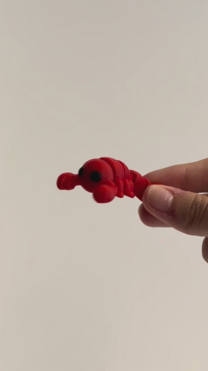 Steven (Scorpion) shown moving in a hand.