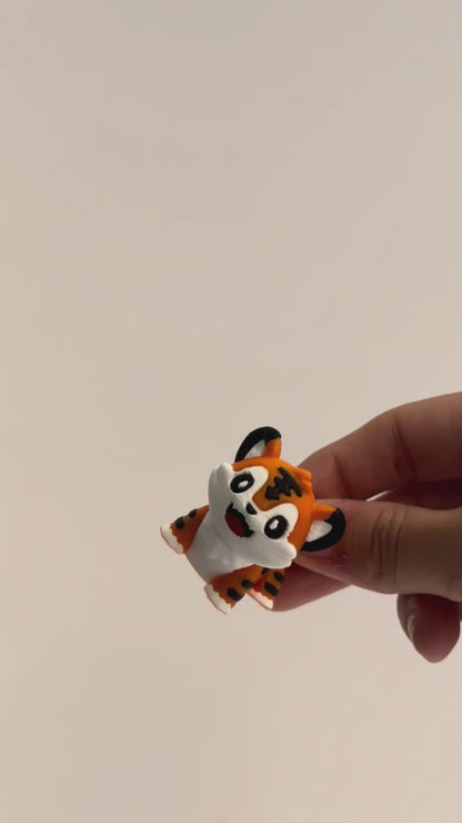 Tony Tiger shown moving in a hand.