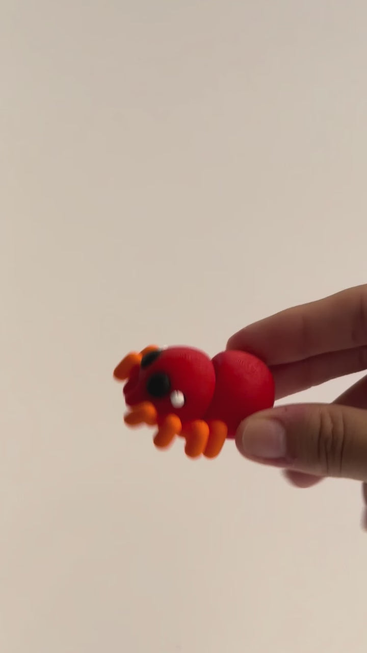 Simon Spider shown moving in a hand.