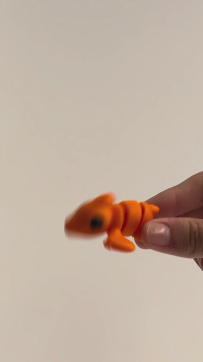 Percy Pterodactyl shown moving in a hand.