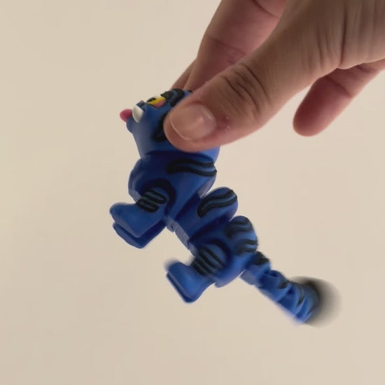 Derpi Cat – K-pop Demon Hunters Figure shown moving in a hand.