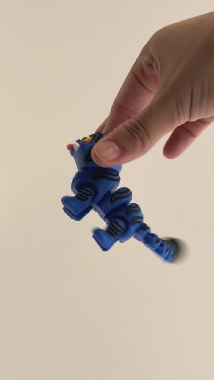 Derpi Cat – K-pop Demon Hunters Figure shown moving in a hand.
