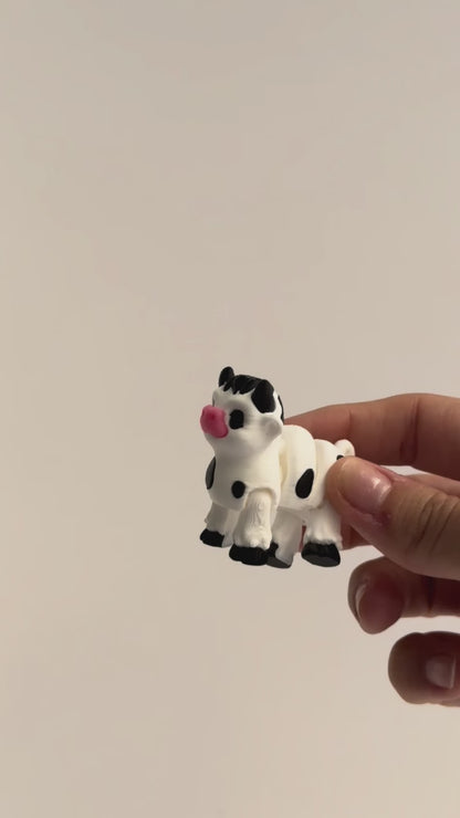 Cow Fidget shown moving in a hand.