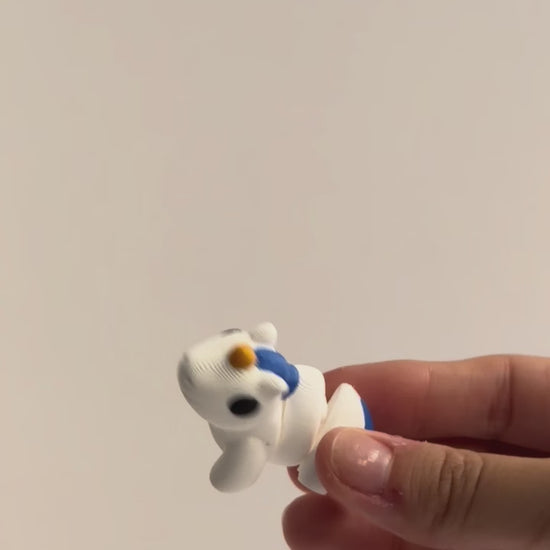 Luna (Unicorn) shown moving in a hand.