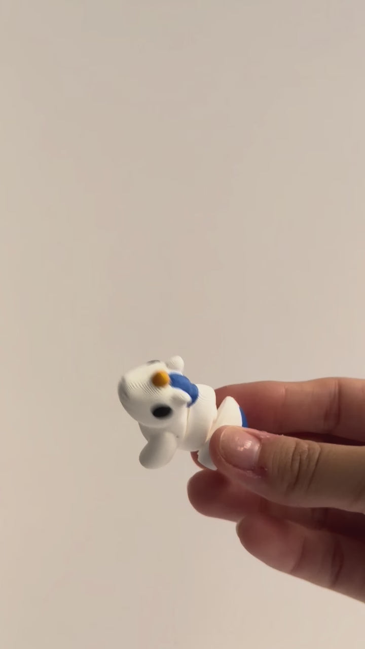 Luna (Unicorn) shown moving in a hand.