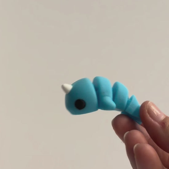 Nova (Narwhal) shown moving in a hand.