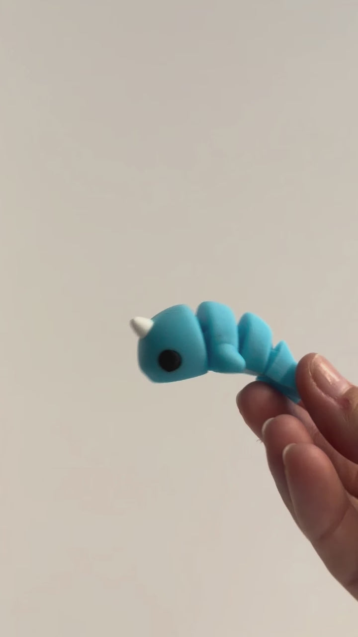 Nova (Narwhal) shown moving in a hand.