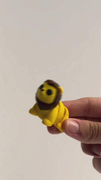 Lion Fidget shown moving in a hand.