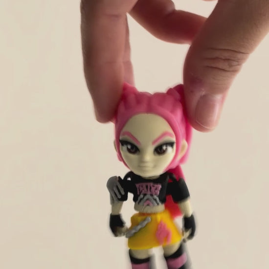 Mira – K-pop Demon Hunters Figure shown moving in a hand.