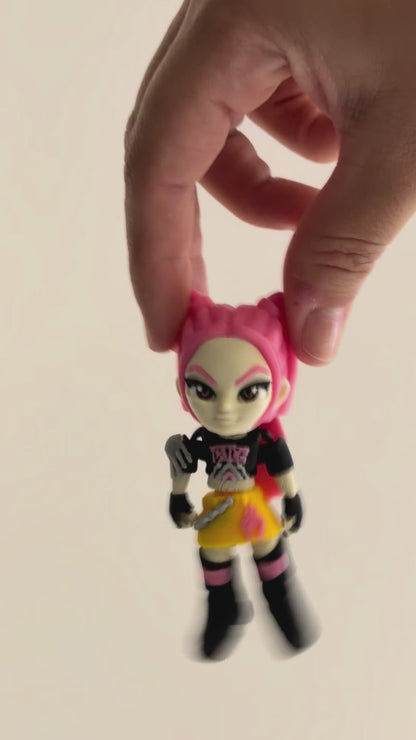 Mira – K-pop Demon Hunters Figure shown moving in a hand.
