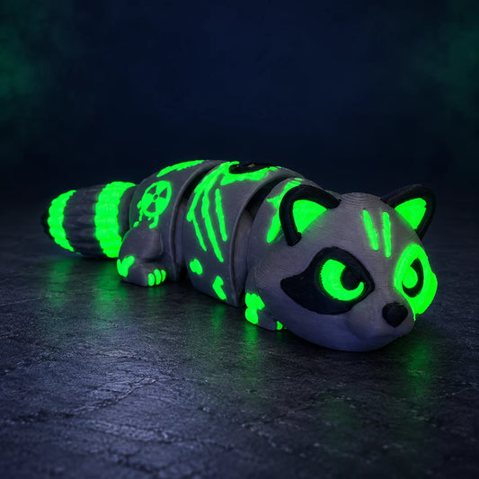 Radioactive Raccoon articulated fidget with glowing green eyes, body markings and striped tail, three-quarter view